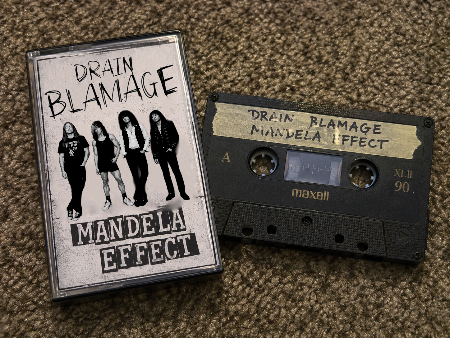 Drain Blamage Mandela Effect cassette and case on a carpet
